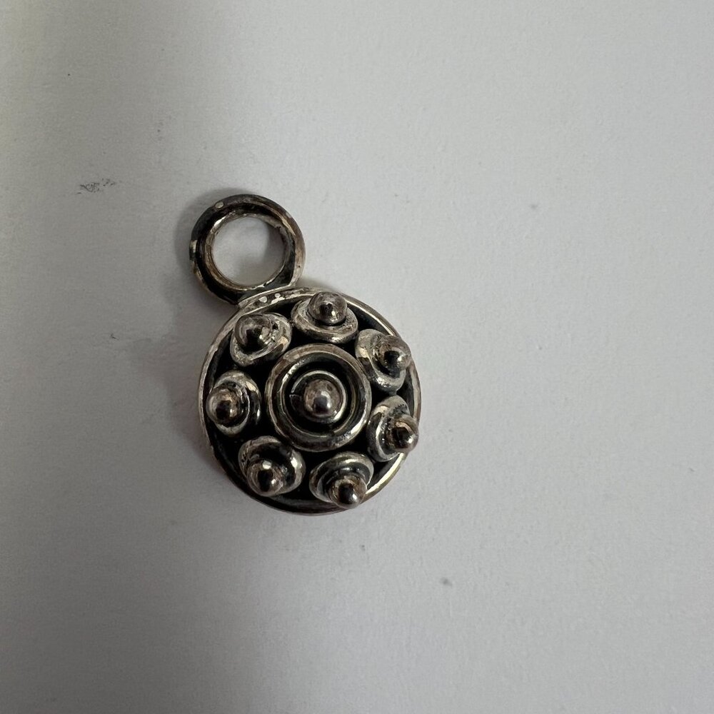 Small Round Doug Paulus 925 Sterling Silver Pendant With Intricate Design